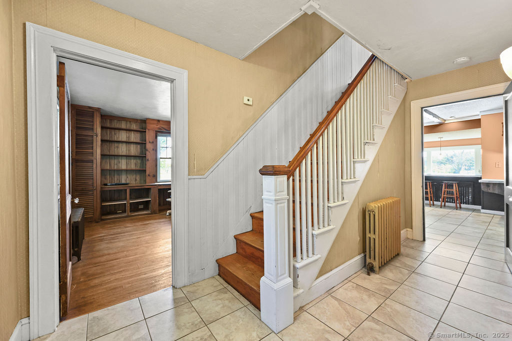 105 School Road Bolton, CT 06043 - Photo 21 of 39 a view of a hallway with staircase