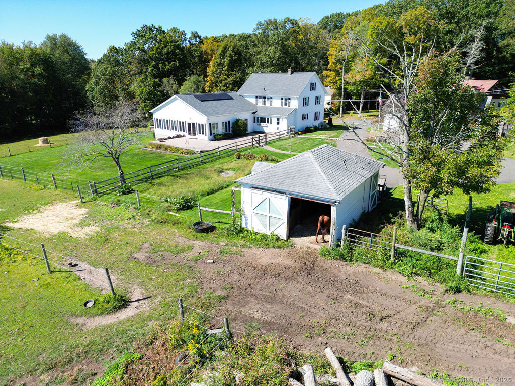 105 School Road Bolton, CT 06043 - Photo 36 of 39 a front view of a house with garden