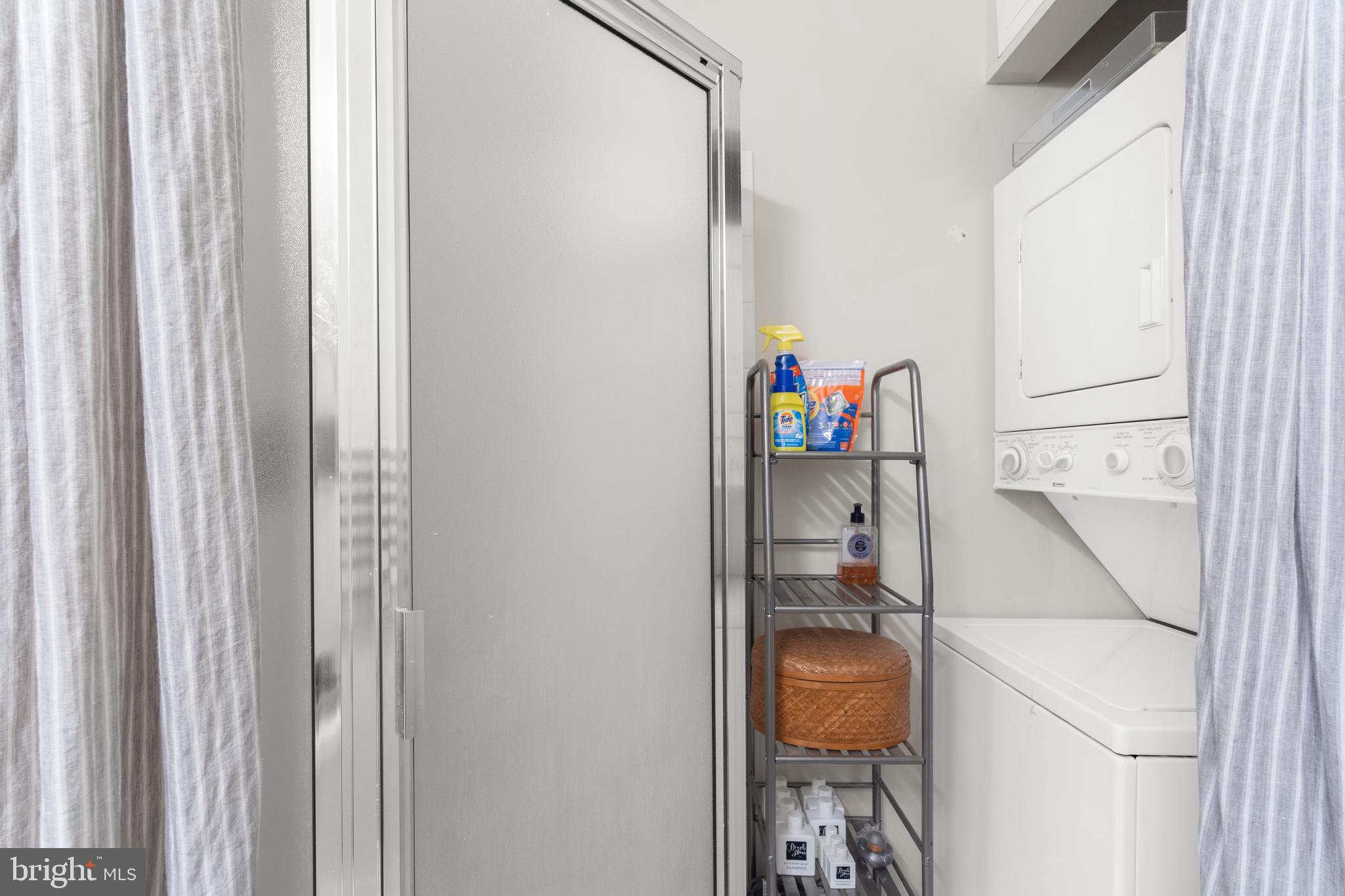 645 Oakland Hills Drive, Unit 1B Arnold, MD 21012 - Photo 22 of 30 Stackable laundry in full hall bath