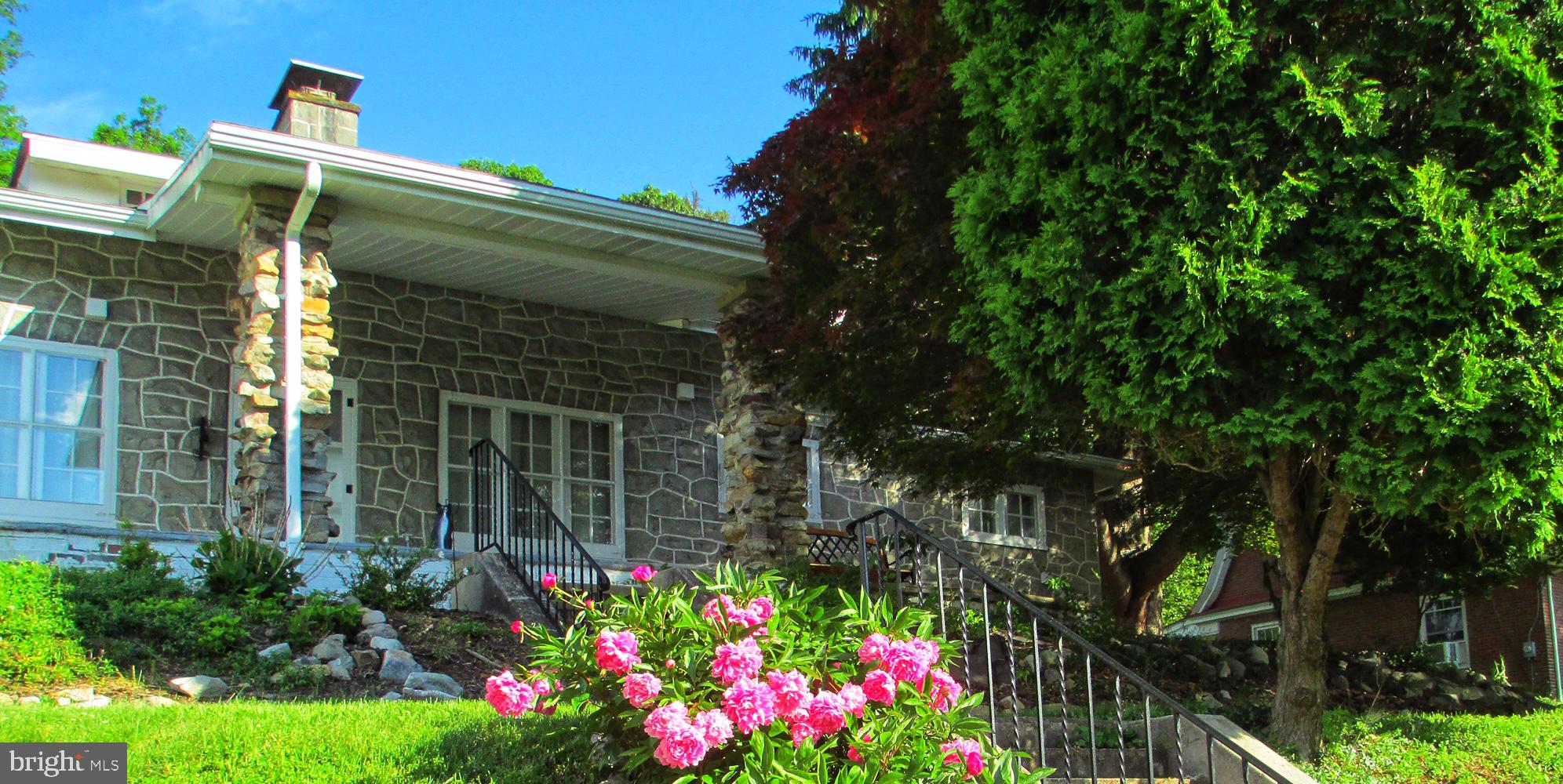 1700 Friedensburg Road Reading, PA 19606 - Photo 2 of 37 Front view with magnolias Springtime