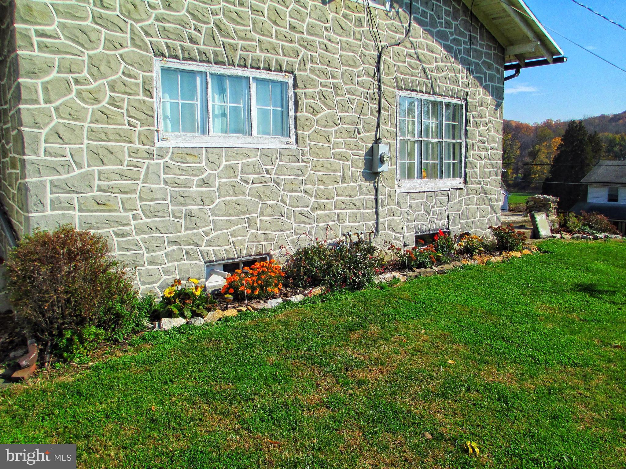 1700 Friedensburg Road Reading, PA 19606 - Photo 34 of 37 View from right hand side of home- flower beds