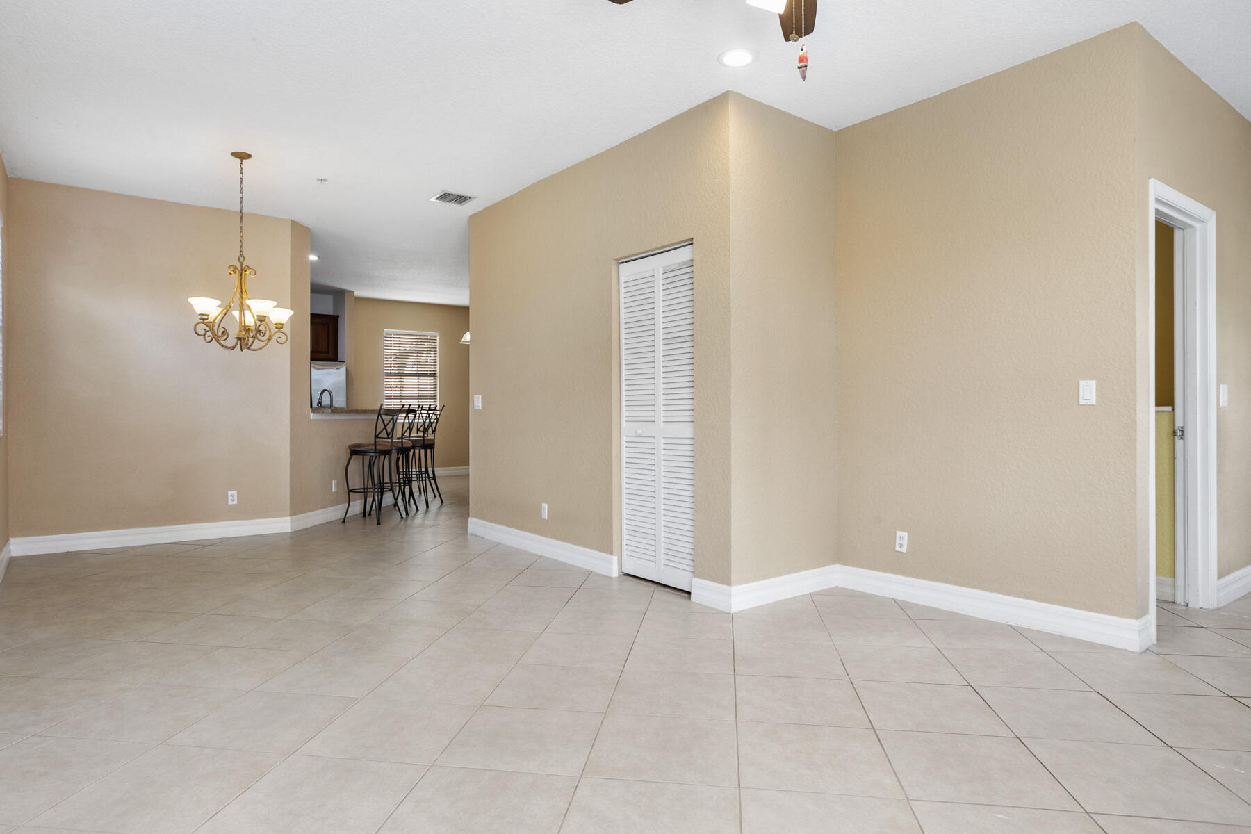114 Locustberry Lane, Unit 101 Jupiter, FL 33458 - Photo 24 of 59 a view of a livingroom with a furniture