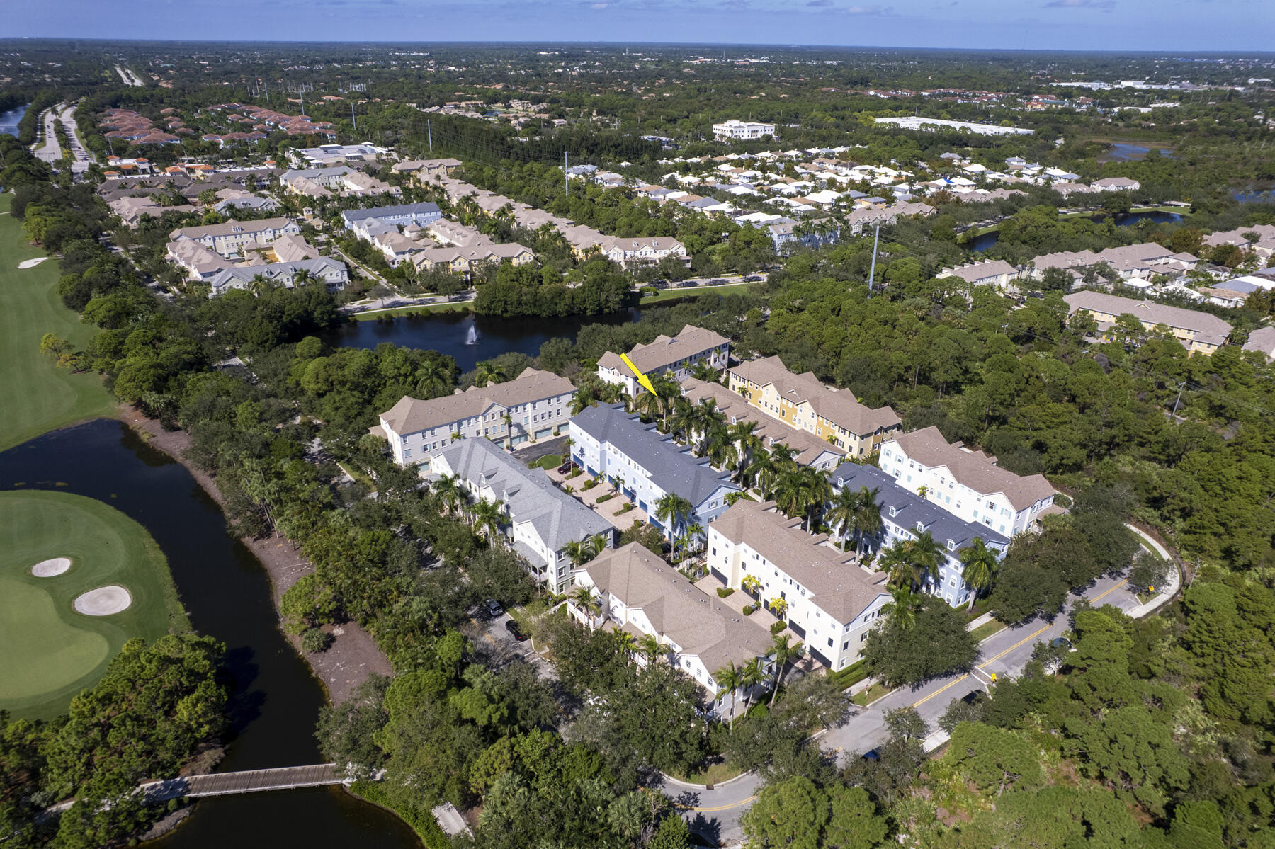 114 Locustberry Lane, Unit 101 Jupiter, FL 33458 - Photo 33 of 59 an aerial view of residential houses with outdoor space