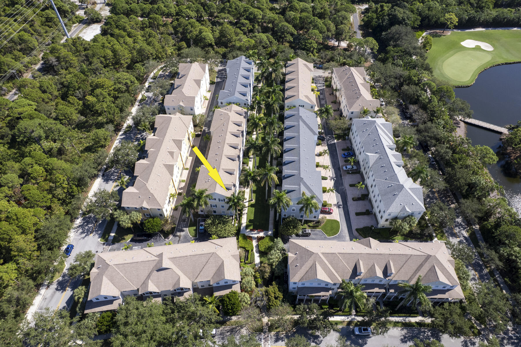 114 Locustberry Lane, Unit 101 Jupiter, FL 33458 - Photo 43 of 59 an aerial view of multiple house