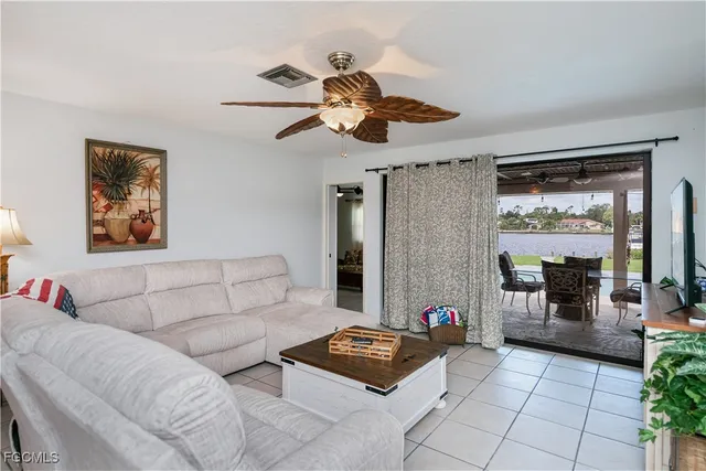 a room with furniture and flat screen tv