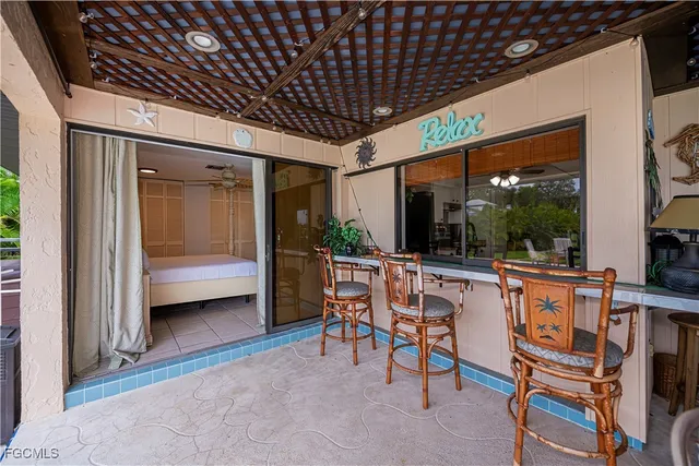 a outdoor dining space with lots of fruit and vegetables