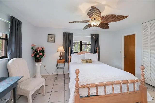 a bathroom with a granite countertop sink mirror and double