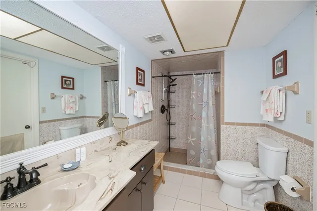 a bed room with a bed and a window