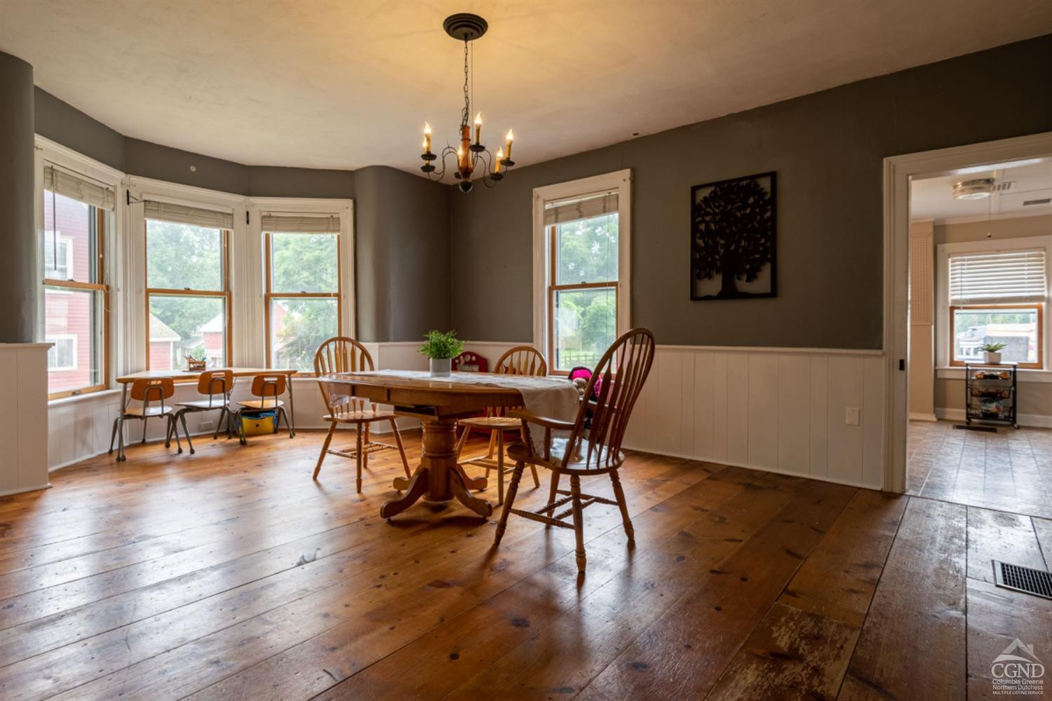 5 Garage Place Road Ghent, NY 12075 - Photo 12 of 41 a view of a dining room with furniture window and wooden floor