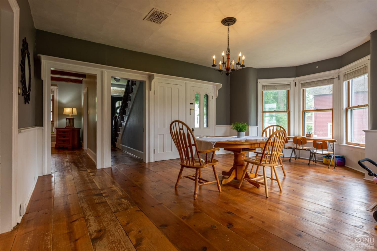 5 Garage Place Road Ghent, NY 12075 - Photo 13 of 41 a view of a dining room with furniture window and wooden floor