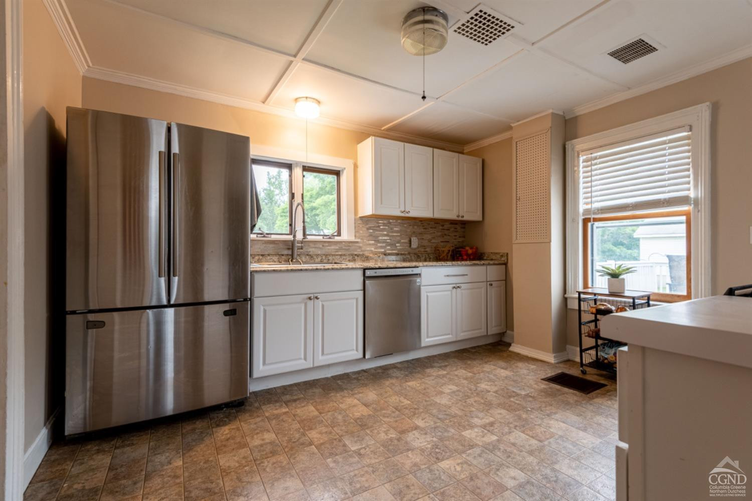 5 Garage Place Road Ghent, NY 12075 - Photo 18 of 41 a kitchen with stainless steel appliances a refrigerator sink and cabinets