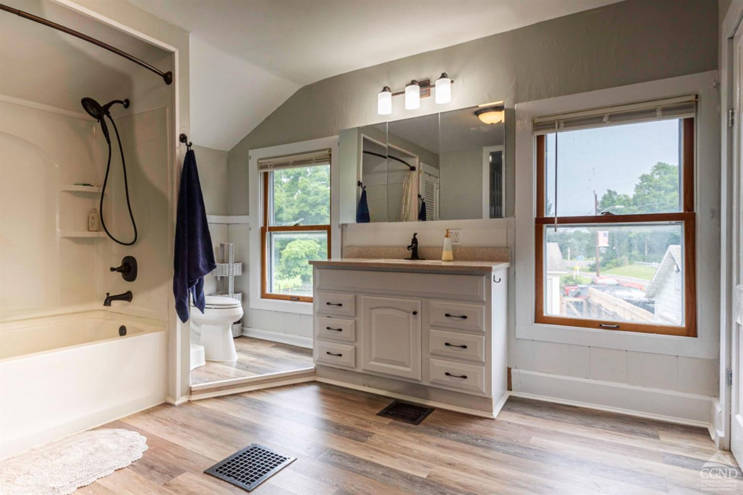 5 Garage Place Road Ghent, NY 12075 - Photo 27 of 41 a spacious bathroom with a granite countertop sink a toilet and a bathtub