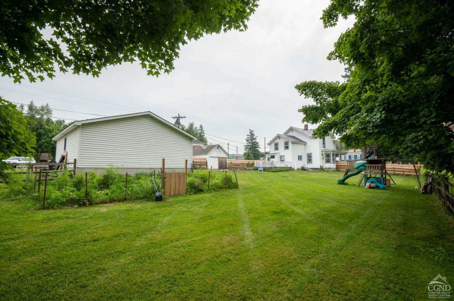 5 Garage Place Road Ghent, NY 12075 - Photo 33 of 41 a view of backyard of house with green space