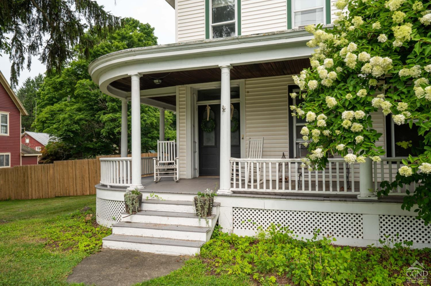 5 Garage Place Road Ghent, NY 12075 - Photo 35 of 41 a front view of a house with a garden
