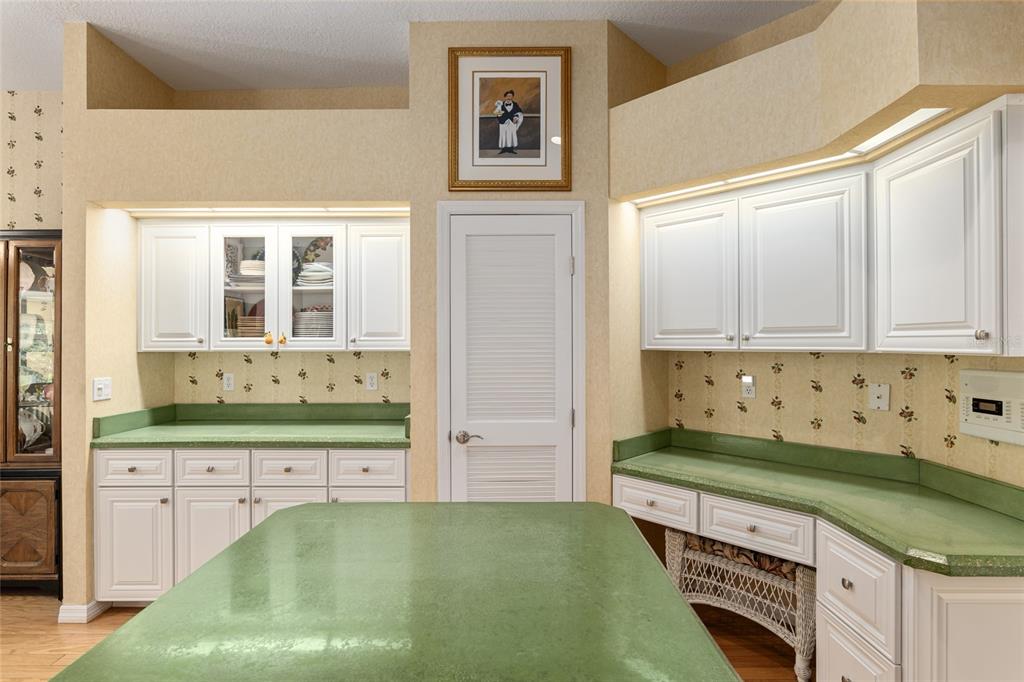 2215 Spring Hill Court Ocala, FL 34471 - Photo 19 of 62 a kitchen with granite countertop a stove and cabinets