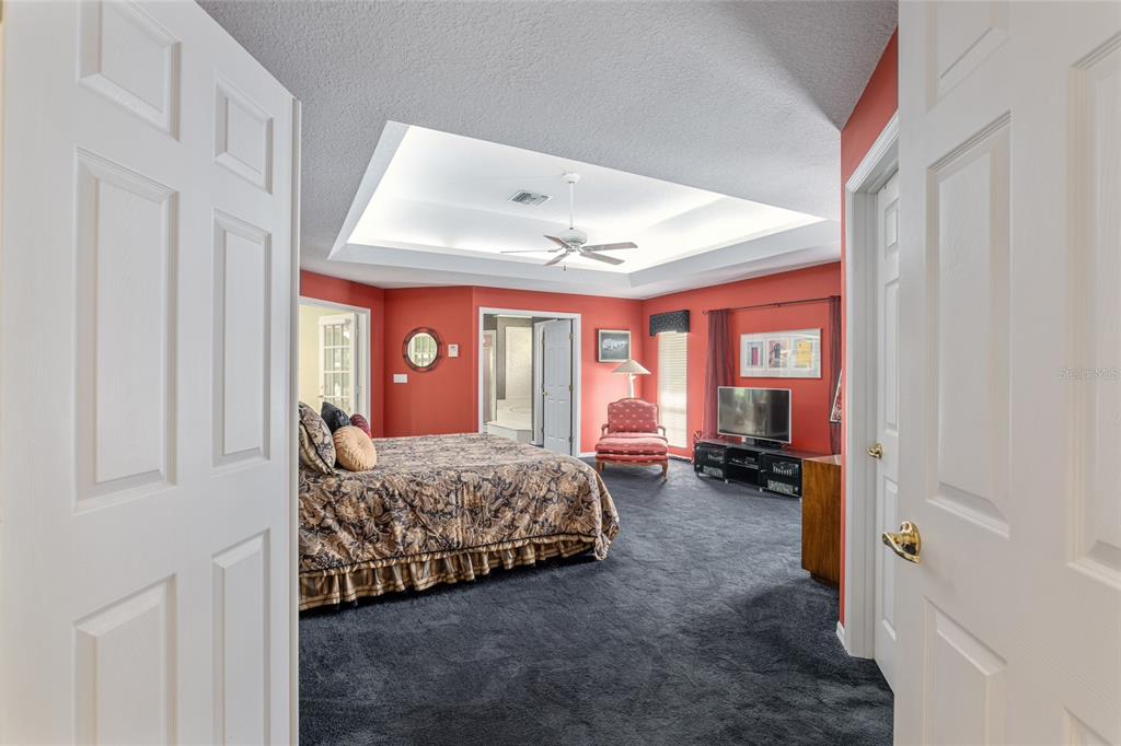 2215 Spring Hill Court Ocala, FL 34471 - Photo 24 of 62 a view of bedroom with furniture and large window