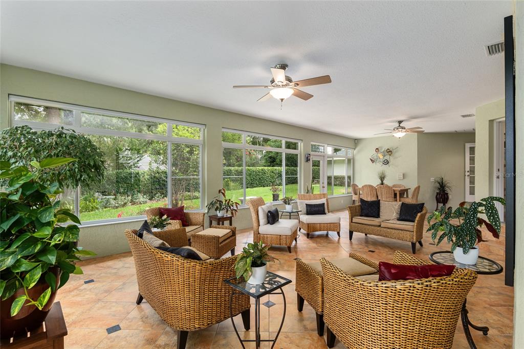 2215 Spring Hill Court Ocala, FL 34471 - Photo 44 of 62 a living room with furniture and a large window