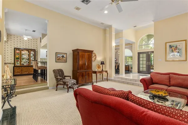 a view of a entryway with furniture and windows