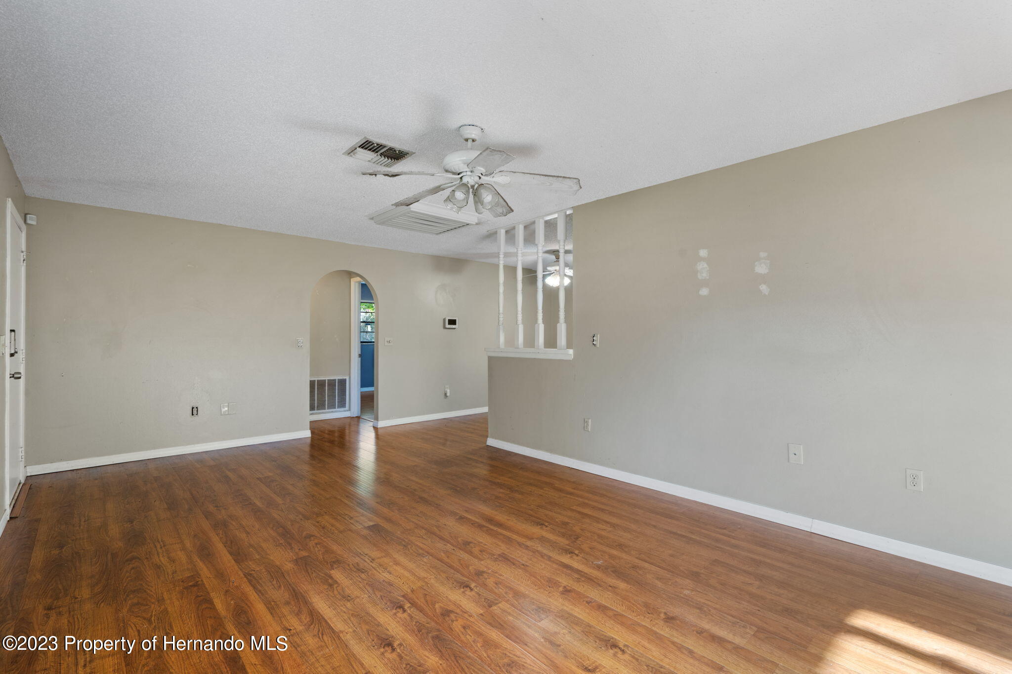 10479 Thornberry Drive Spring Hill, FL 34608 - Photo 11 of 44 a view of an empty room with a window