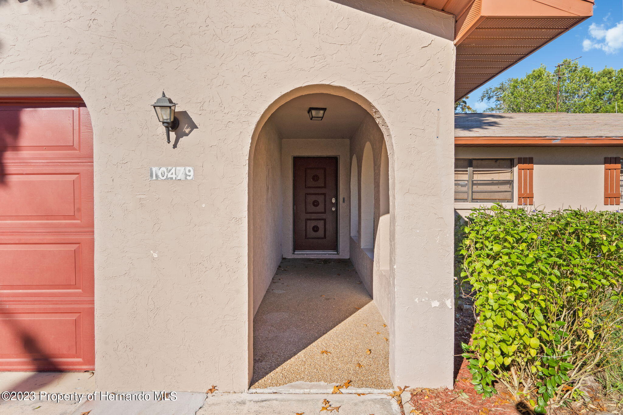 10479 Thornberry Drive Spring Hill, FL 34608 - Photo 8 of 44 a view of a entryway door of the house