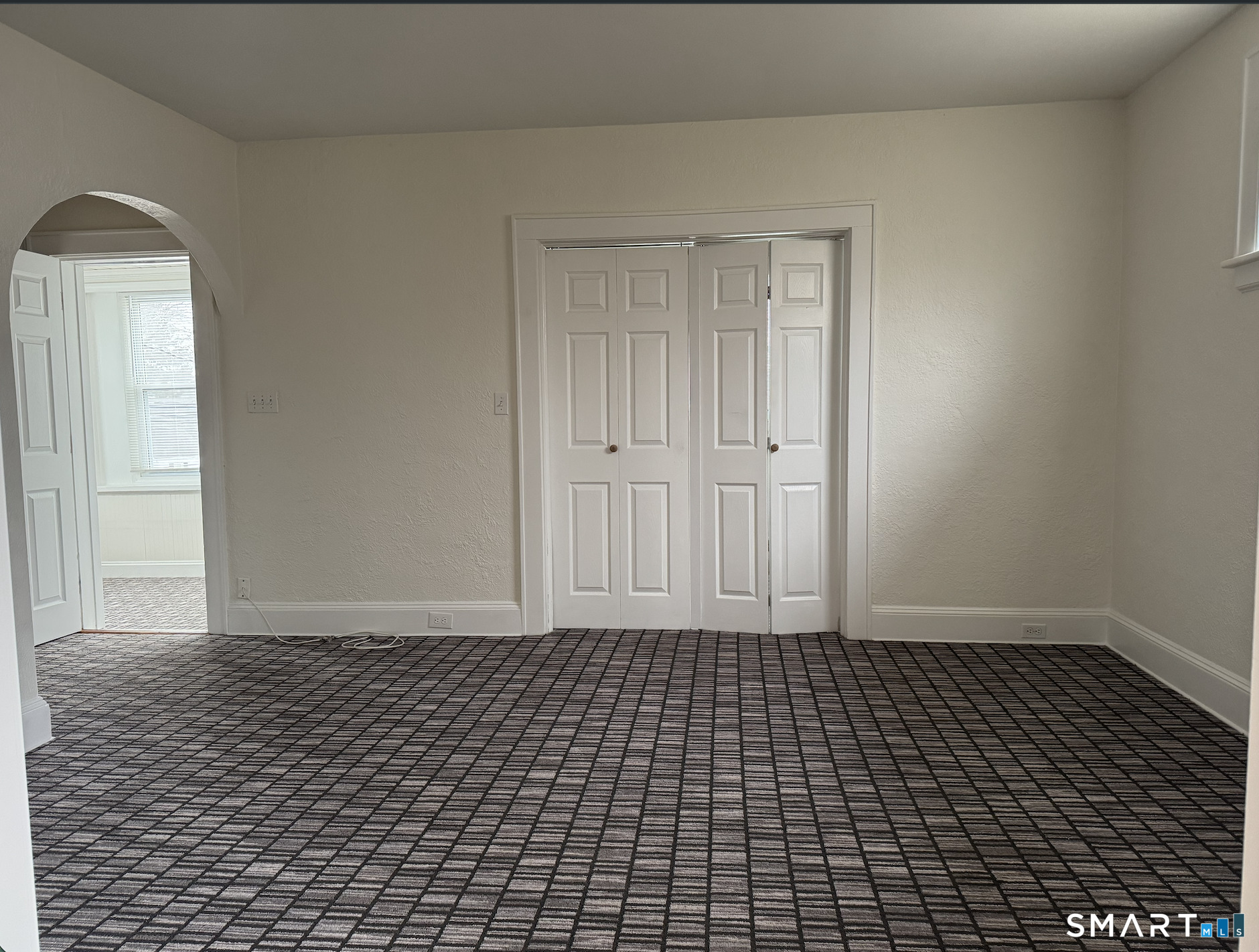 285 Clover Street, Unit 2 Stratford, CT 06614 - Photo 20 of 25 a view of a livingroom with wooden floor