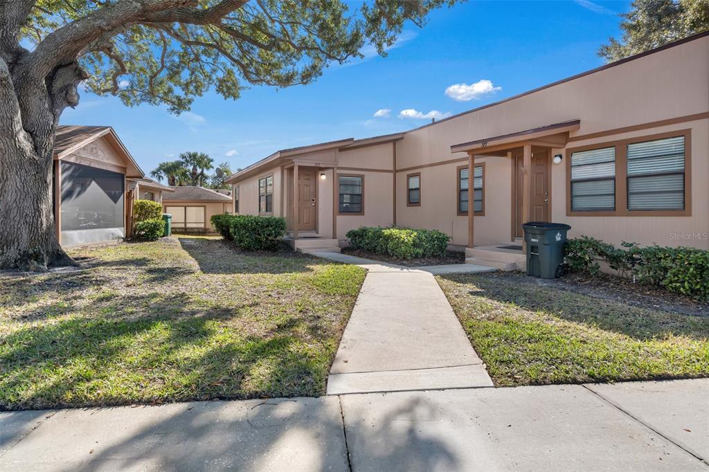 373 Eron Way, Unit 47 Winter Garden, FL 34787 - Photo 26 of 41 a front view of a house with garden