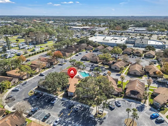an aerial view of residential houses and city view