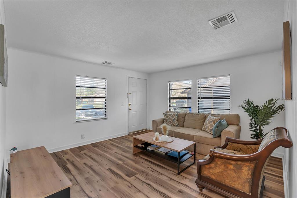 373 Eron Way, Unit 47 Winter Garden, FL 34787 - Photo 4 of 41 a living room with furniture