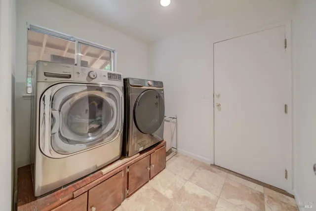 a bathroom with a sink a mirror and vanity