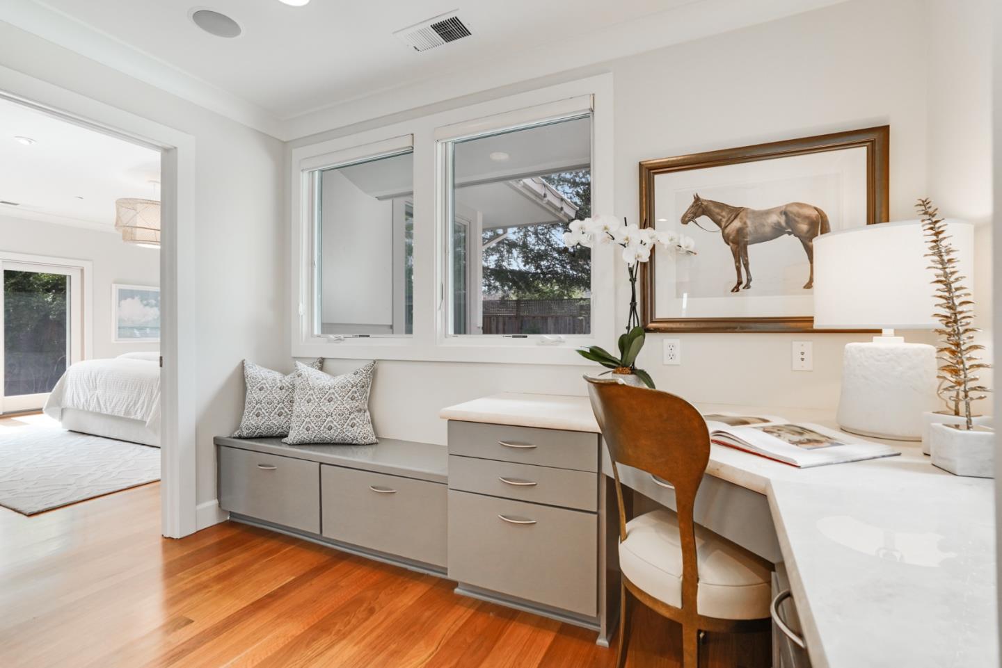 196 Merritt Road Los Altos, CA 94022 - Photo 14 of 46 a living room with furniture and painting on the wall