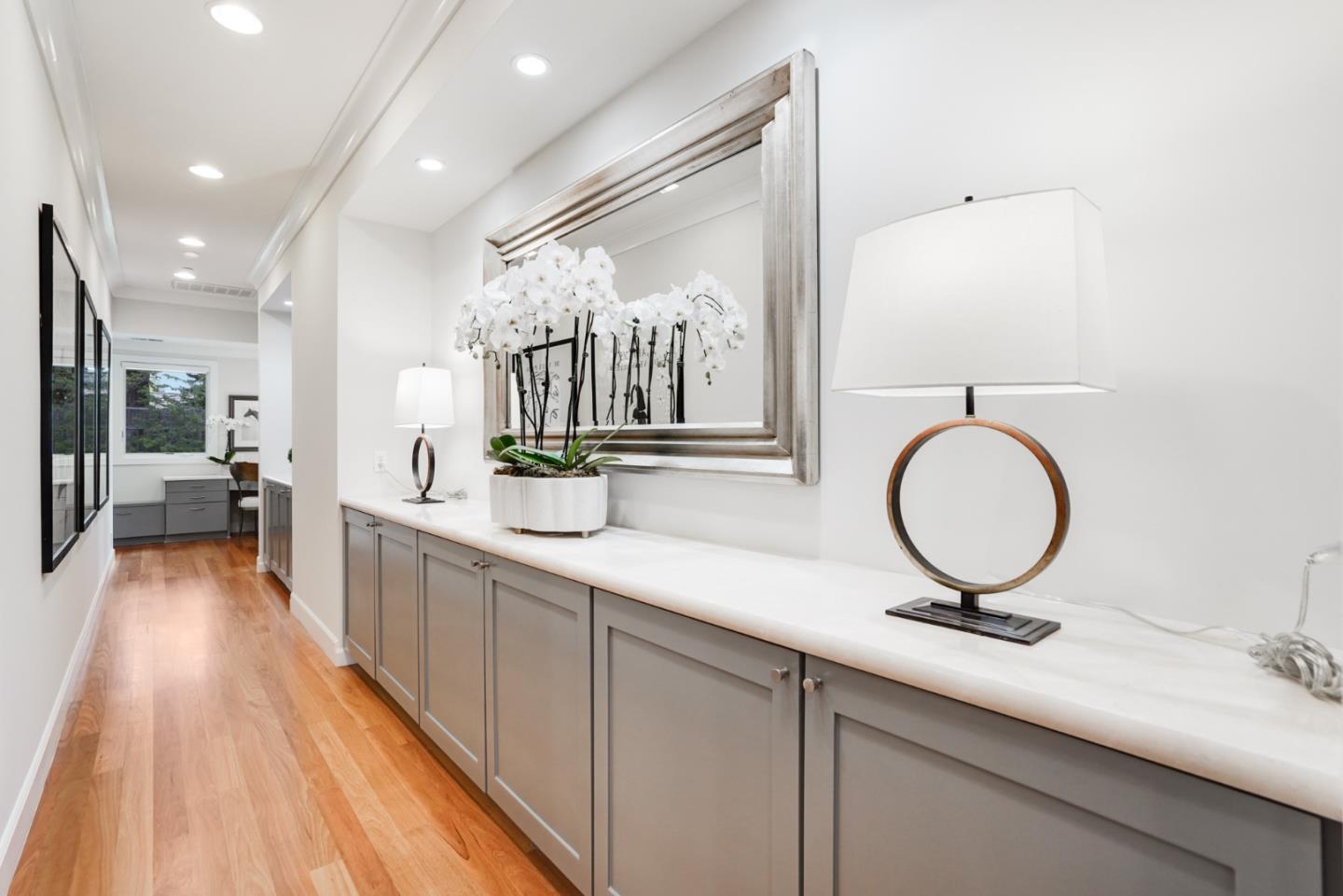 196 Merritt Road Los Altos, CA 94022 - Photo 21 of 46 a view of a bathroom with mirror and sink