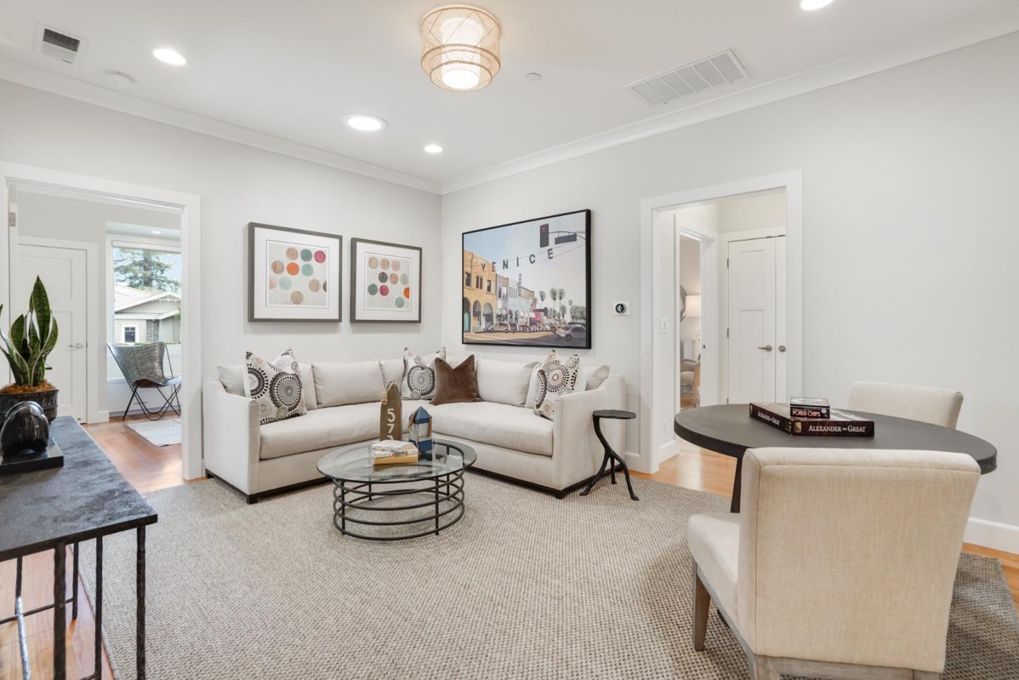 196 Merritt Road Los Altos, CA 94022 - Photo 22 of 46 a living room with furniture a wall paintings and a window