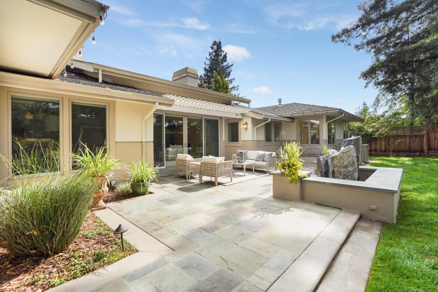 196 Merritt Road Los Altos, CA 94022 - Photo 42 of 46 a view of a house with backyard sitting area and porch