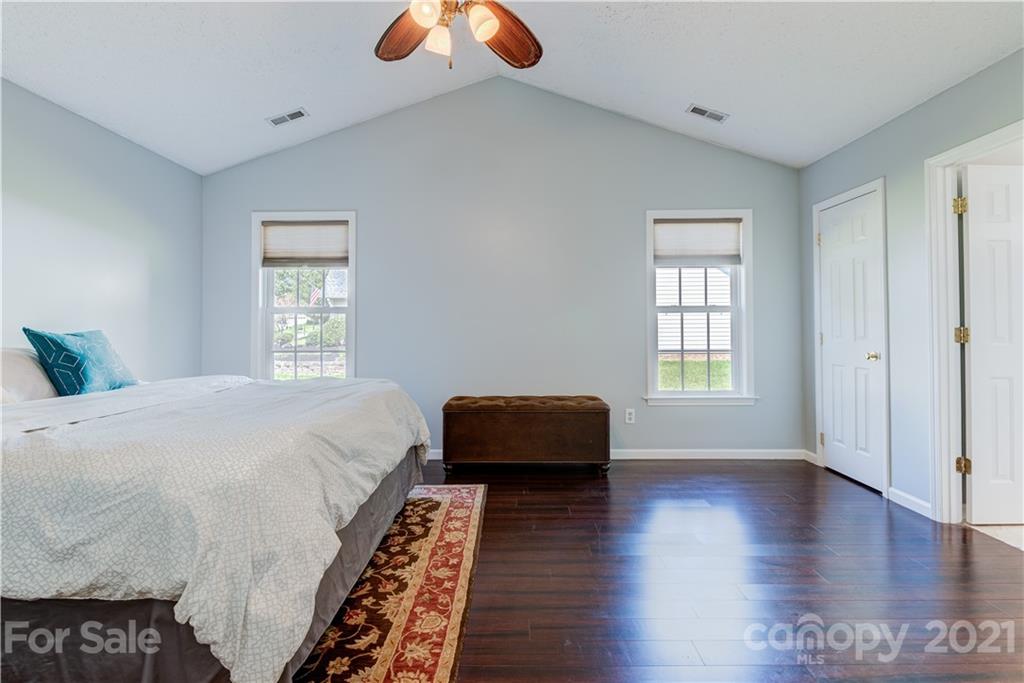 461 Planters Creek Road Fletcher, NC 28732 - Photo 12 of 26 a bedroom with bed and window