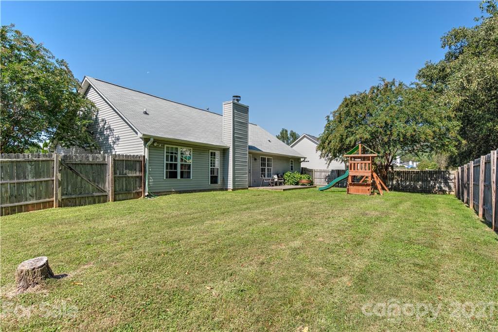 461 Planters Creek Road Fletcher, NC 28732 - Photo 23 of 26 a view of a house with backyard and porch