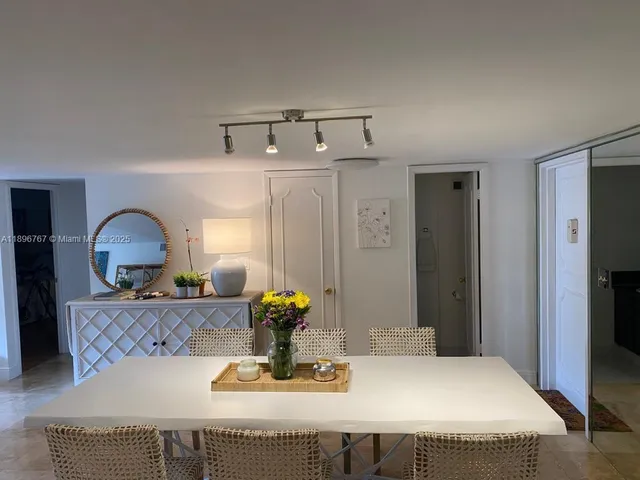 a bedroom with a bed and couch