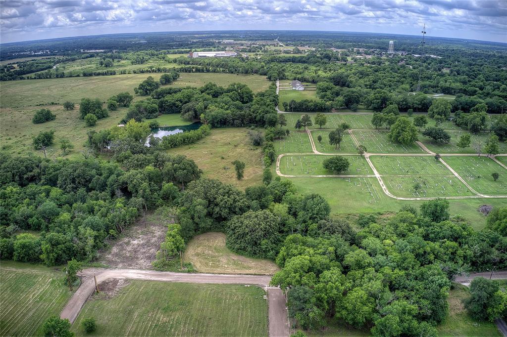 Tbd Sycamore Street Commerce, TX 75428 - Photo 11 of 11 an aerial view of a house with a yard