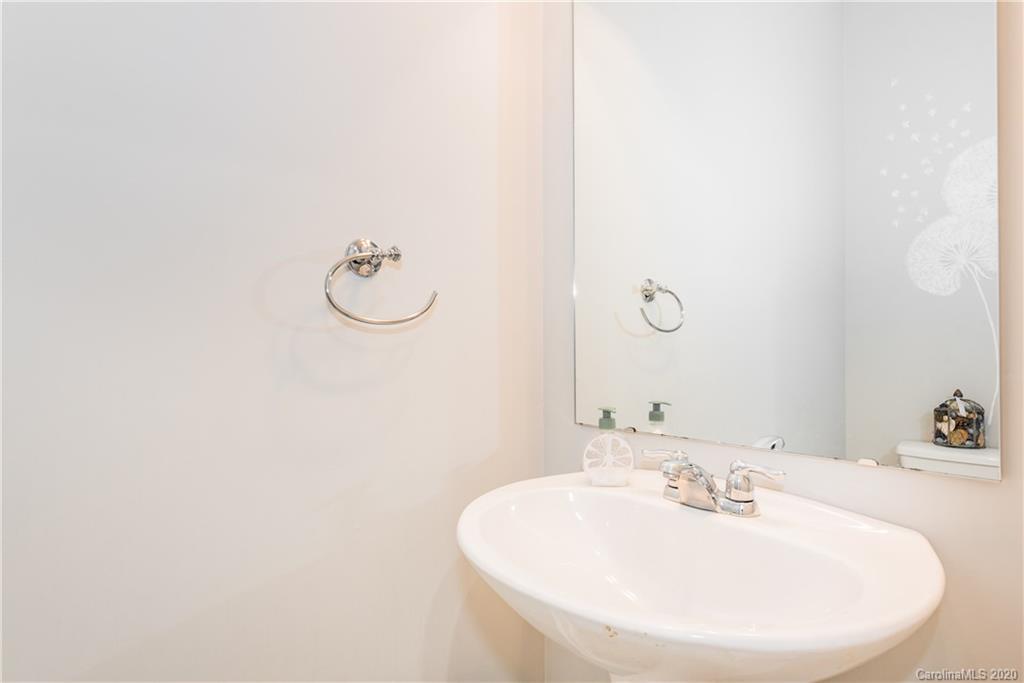 4002 Farm Pond Road Indian Trail, NC 28079 - Photo 16 of 32 a bathroom with a sink and a mirror