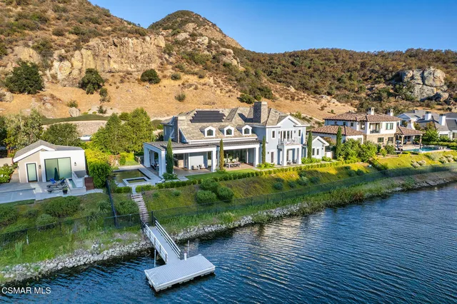 an aerial view of a house with a garden