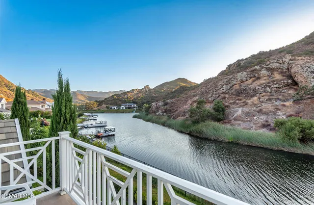 a view of balcony and yard