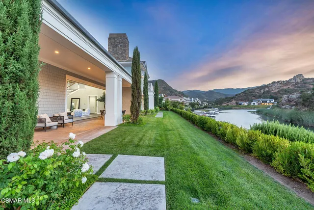 a view of a garden with potted plants