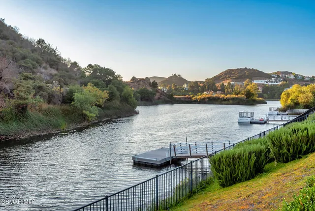 a view of a lake with a garden