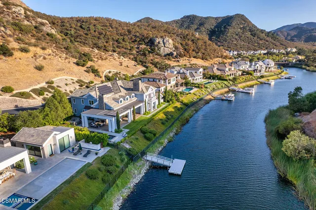 an aerial view of a house with a garden