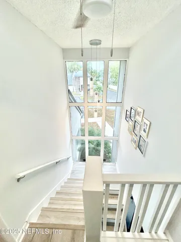 a front view of a house with wooden floor