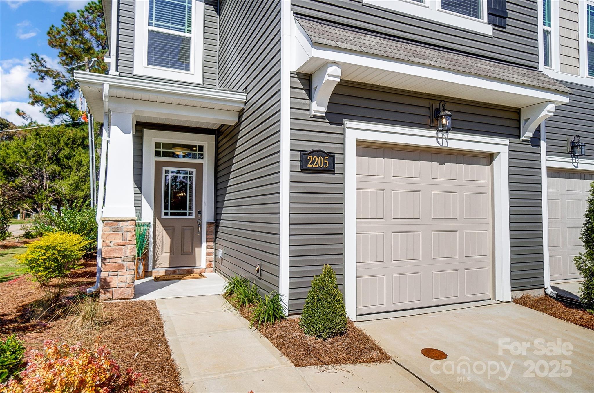 2475 Hedgecliff Road Kannapolis, NC 28083 - Photo 3 of 20 a view of a house with a door and a tree