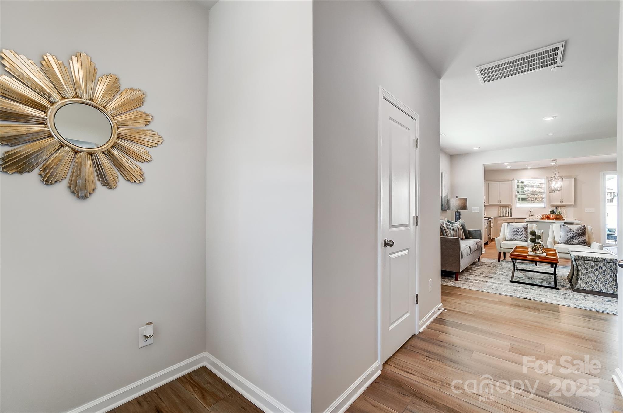 2475 Hedgecliff Road Kannapolis, NC 28083 - Photo 4 of 20 a living room with furniture and a chandelier