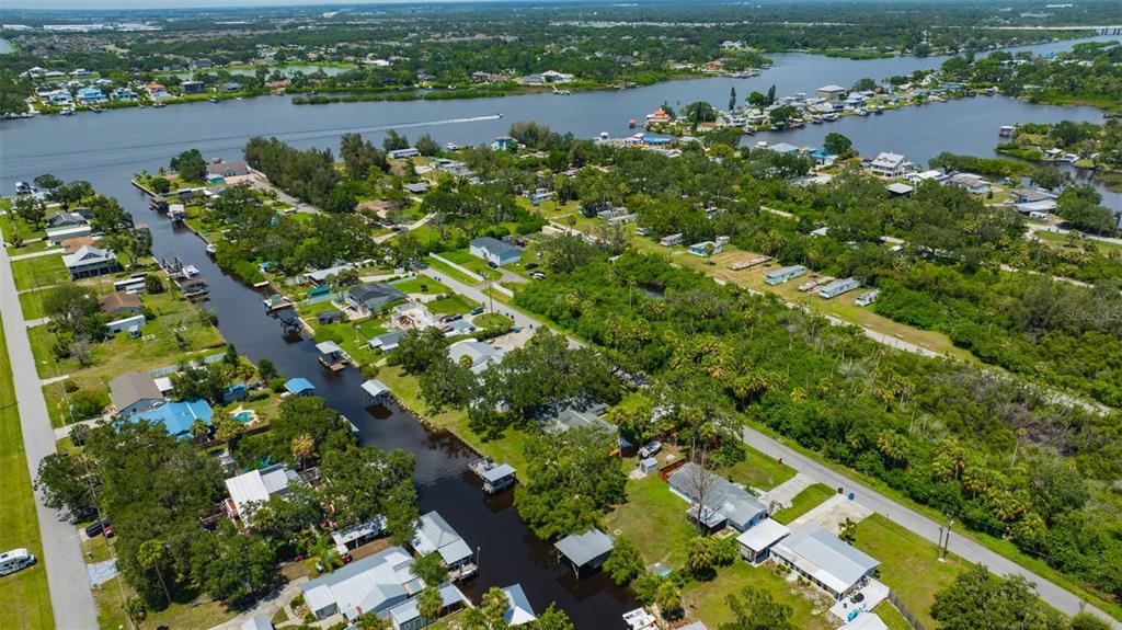 9935 River Drive Gibsonton, FL 33534 - Photo 4 of 29 an aerial view of a residential houses with outdoor space and trees