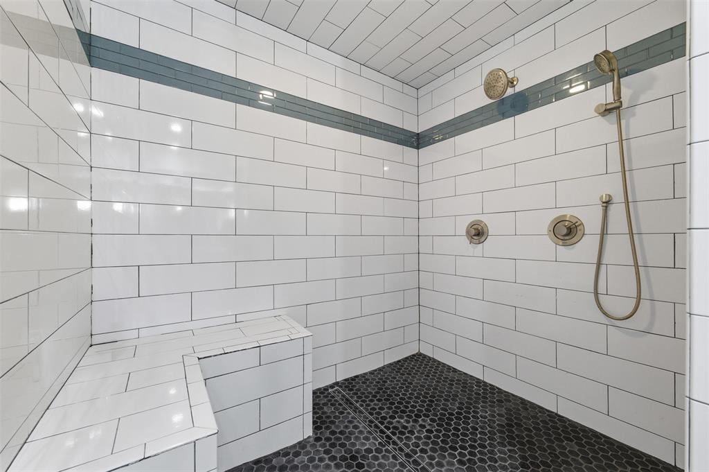 4837 Cedar Springs Road, Unit 311 Dallas, TX 75219 - Photo 15 of 17 Full bathroom featuring tiled shower
