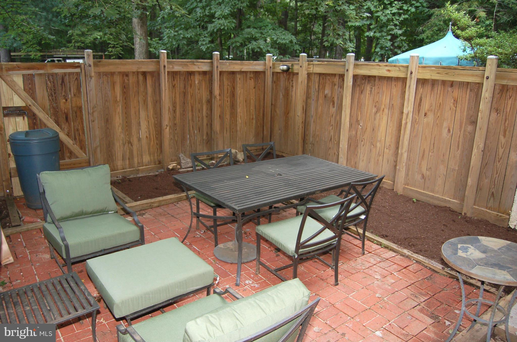 2452 Cloudcroft Square Reston, VA 20191 - Photo 19 of 25 Patio with Flower Beds