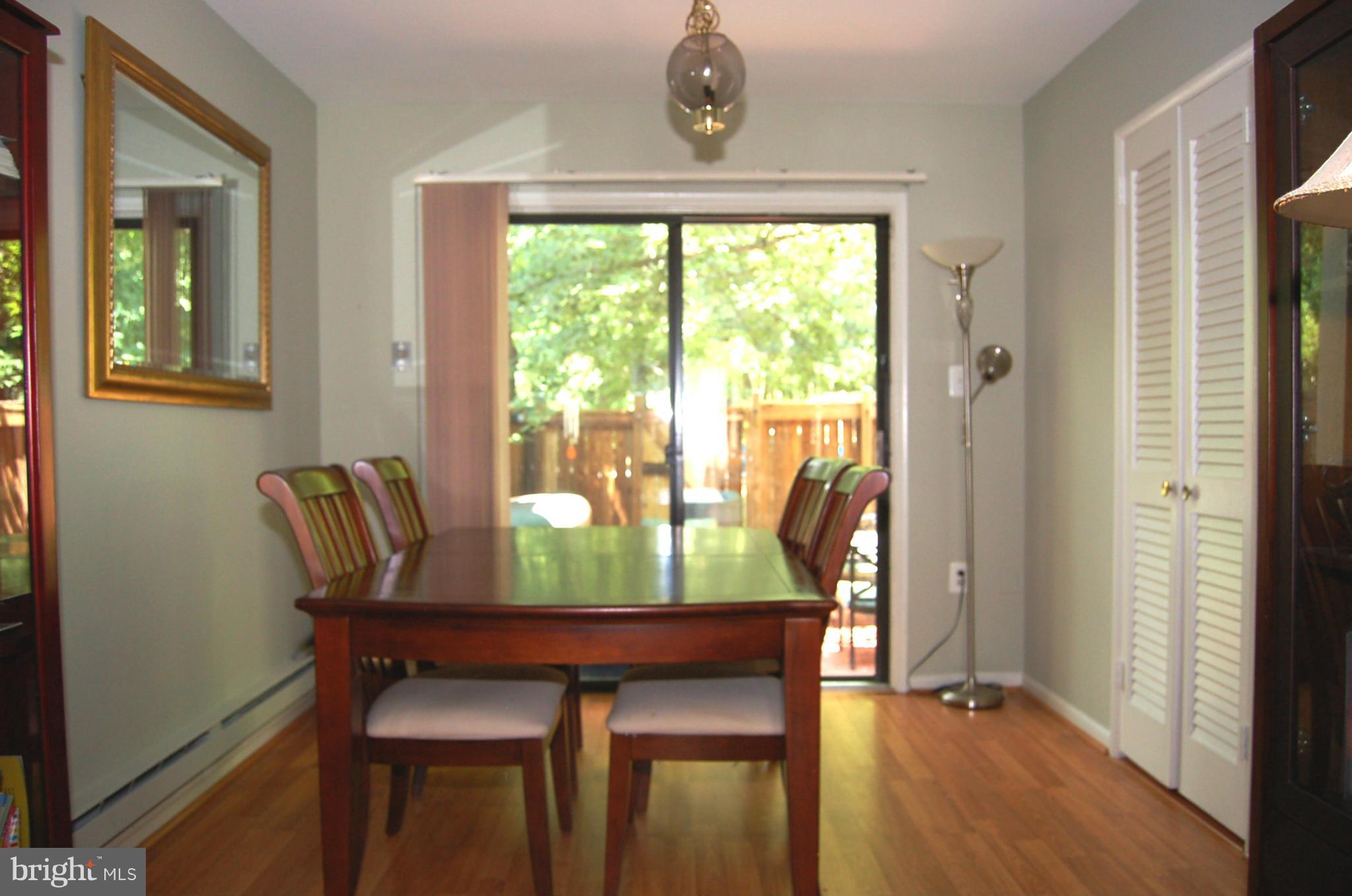 2452 Cloudcroft Square Reston, VA 20191 - Photo 6 of 25 Dining Room with Patio View